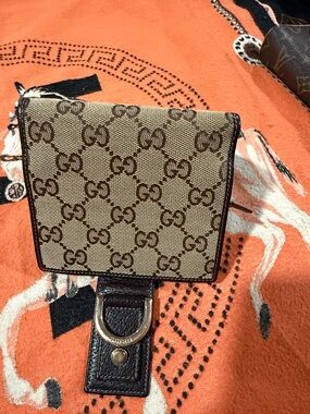 Gucci Beige and Brown Monogram wallet like new.